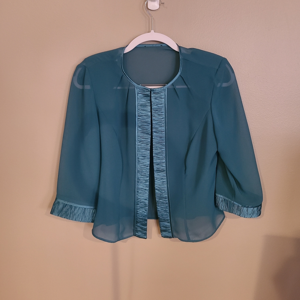 Chic Teal Sheer Blouse with Textured Trim